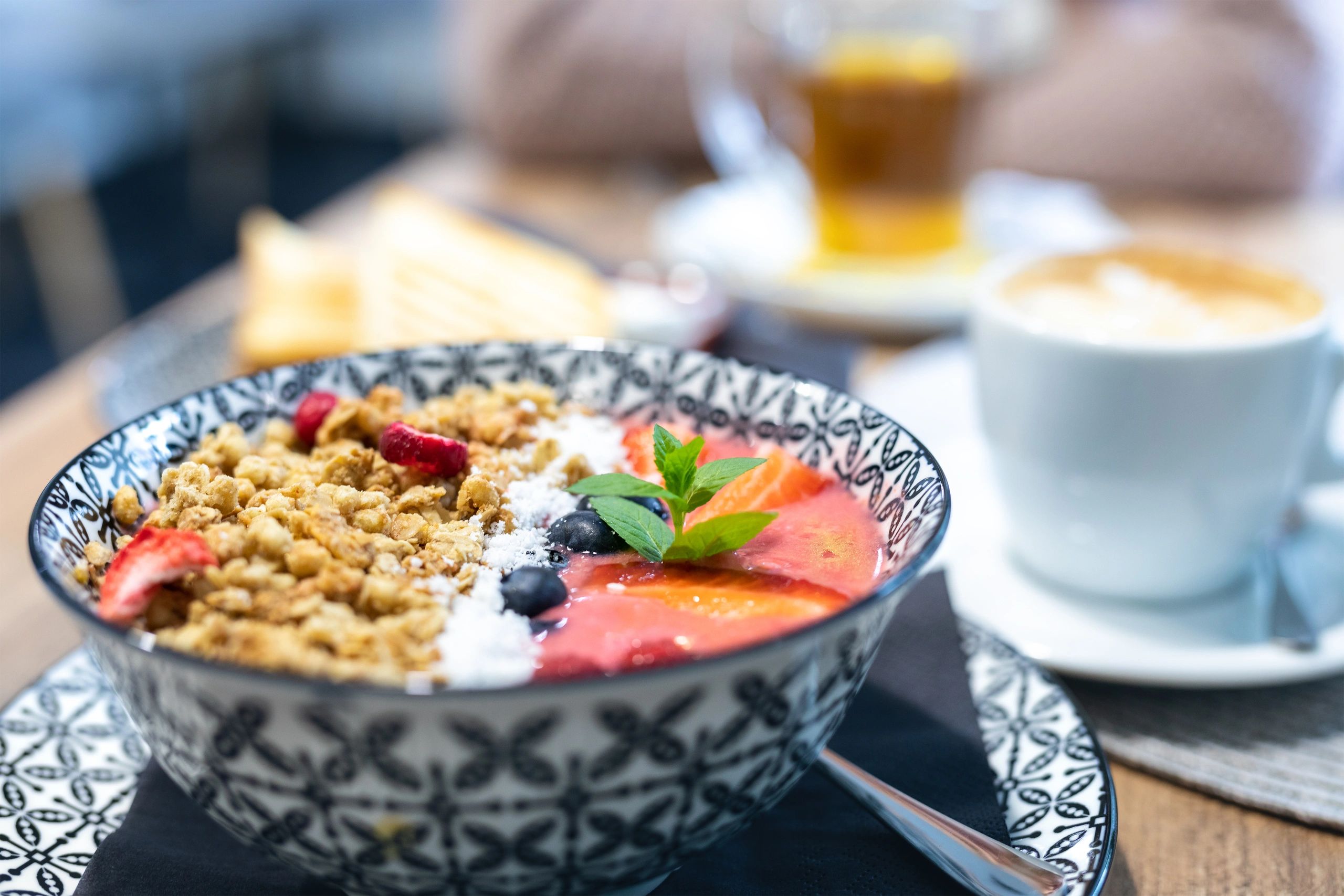 Cafe breakfast plate with toast in the background