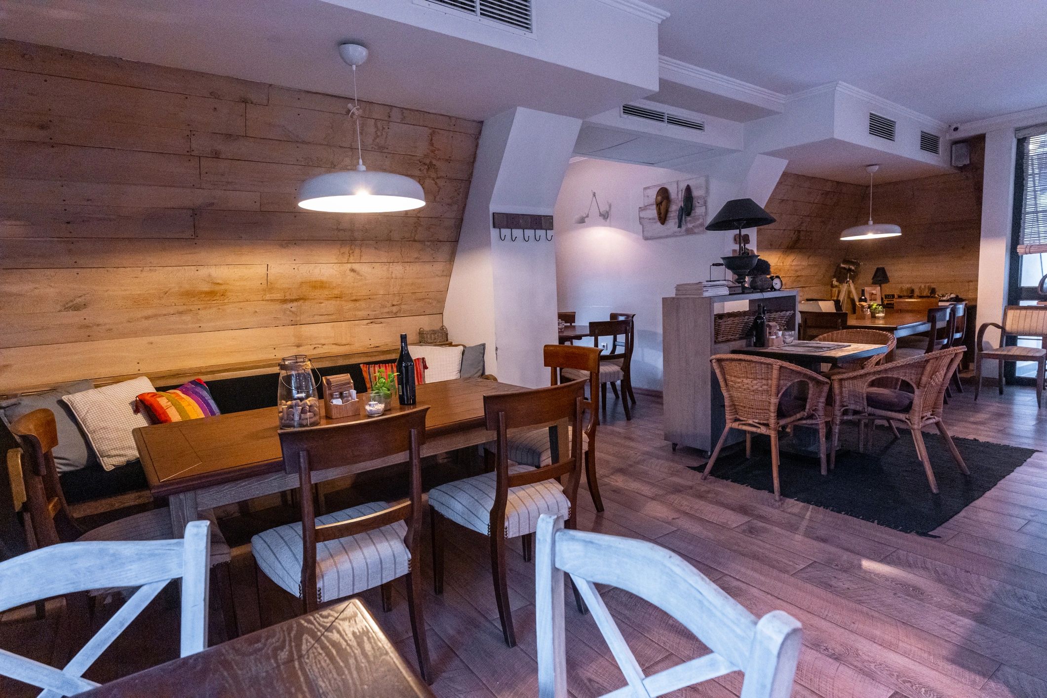 Cozy cafe interior with a modern coffee bar