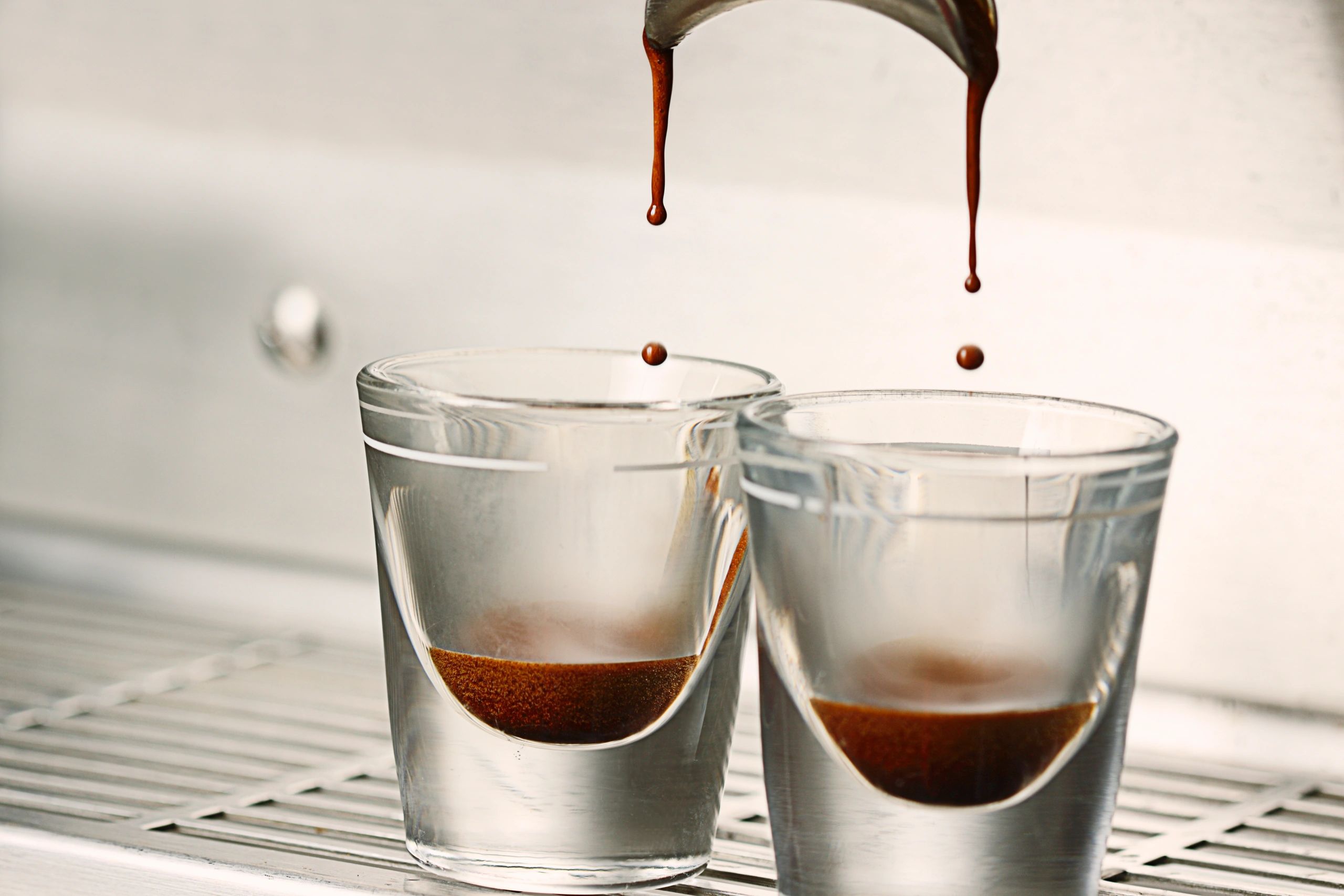 Double shot espresso extraction into shot glasses